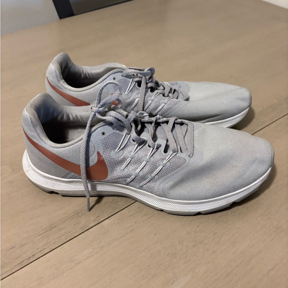 Nike women’s  Gray and copper Running Shoes